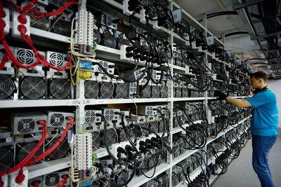 A glimpse of a bustling mining farm filled with mining rigs.